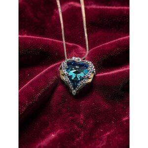 vintage Gold Angel Wings heart shaped silver tone Tiny Ruby inset in blue crysta